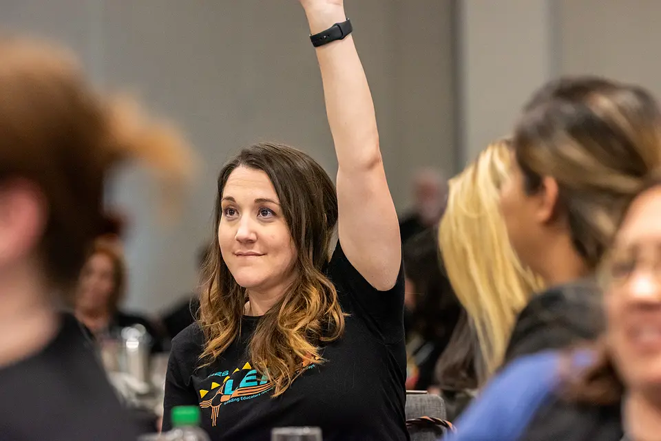 LEAP24web LEAP Atendee raising hand